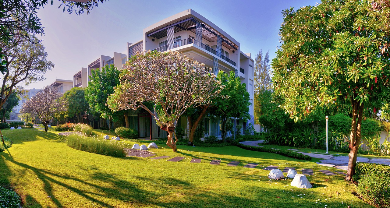 Northstar Greens, Ahmedabad — Landscaped pool deck and clubhouse